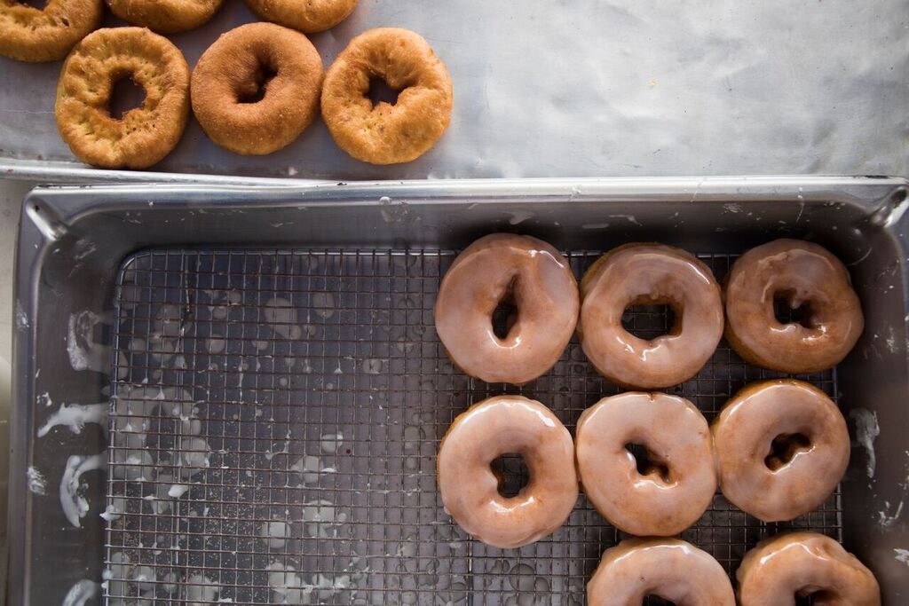 Tray of fresh glazed donuts