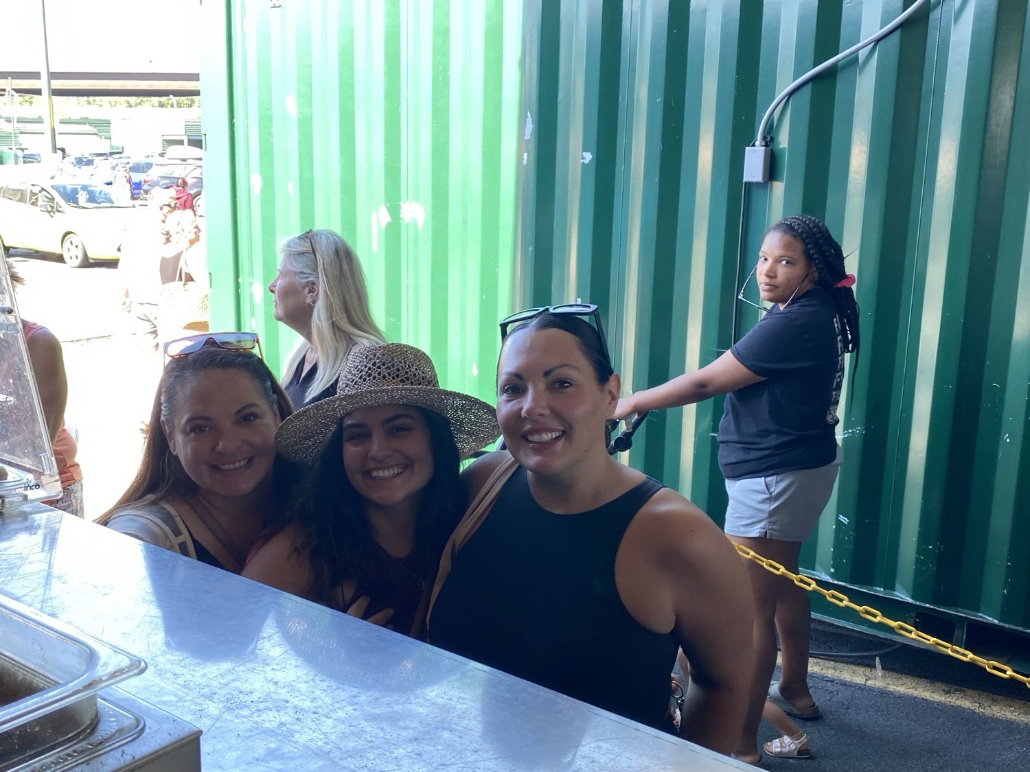 Happy customers with donuts